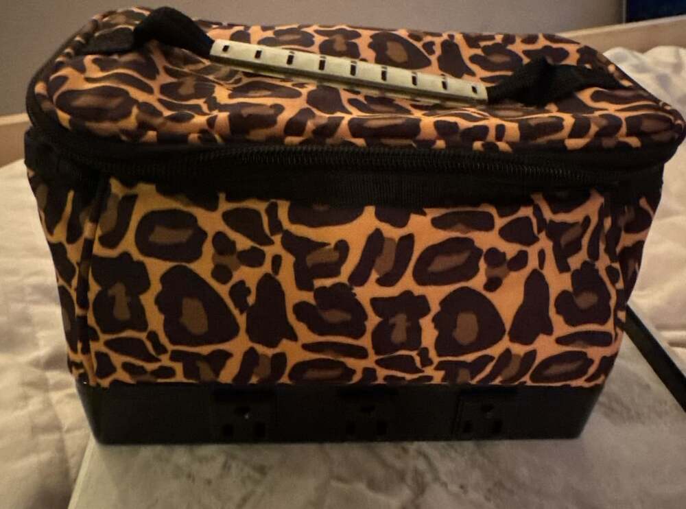 Leopard Print travel bag with six charging ports